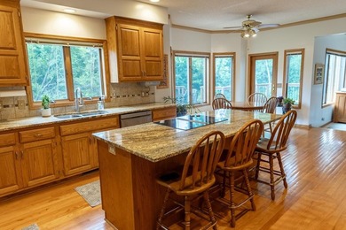 Impeccably maintained home in a picturesque May Township setting - photo 11