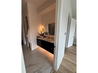 Luxury Living Half Duplex Meets City Convenience in this