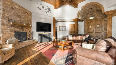 Lodge-style lakefront retreat sitting on over 1 acre with an - photo 11