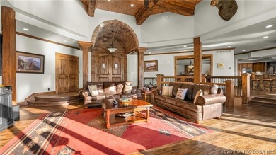 Lodge-style lakefront retreat sitting on over 1 acre with an - photo 12