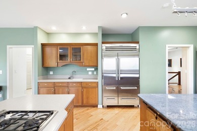 Step into this Kenmure home that feels like a private retreat - photo 12