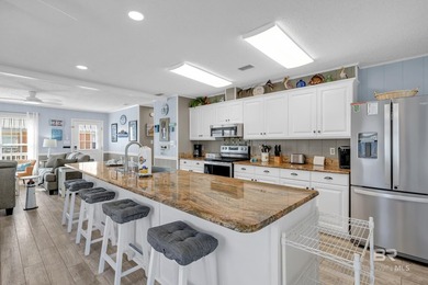 Welcome to the Playful Pelican! This 2BR/2BA raised beach - photo 14