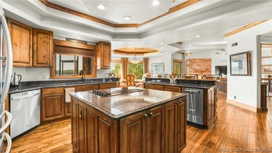 Lodge-style lakefront retreat sitting on over 1 acre with an - photo 18