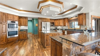 Lodge-style lakefront retreat sitting on over 1 acre with an - photo 20