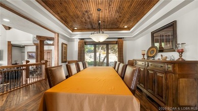 Lodge-style lakefront retreat sitting on over 1 acre with an - photo 24