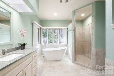 Step into this Kenmure home that feels like a private retreat - photo 25
