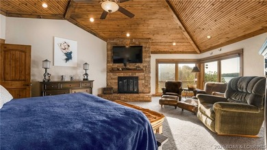 Lodge-style lakefront retreat sitting on over 1 acre with an - photo 26