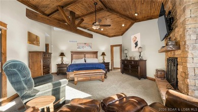 Lodge-style lakefront retreat sitting on over 1 acre with an - photo 27