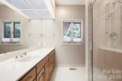 Step into this Kenmure home that feels like a private retreat - photo 27