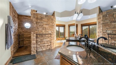 Lodge-style lakefront retreat sitting on over 1 acre with an - photo 28