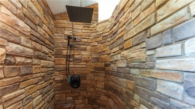 Lodge-style lakefront retreat sitting on over 1 acre with an - photo 30