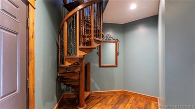 Lodge-style lakefront retreat sitting on over 1 acre with an - photo 31