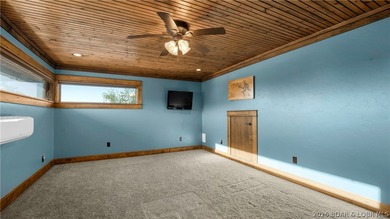 Lodge-style lakefront retreat sitting on over 1 acre with an - photo 32