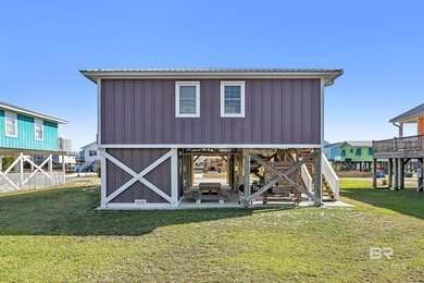 Welcome to the Playful Pelican! This 2BR/2BA raised beach - photo 33