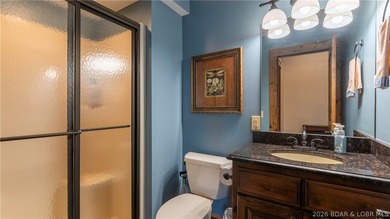 Lodge-style lakefront retreat sitting on over 1 acre with an - photo 36