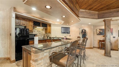 Lodge-style lakefront retreat sitting on over 1 acre with an - photo 46