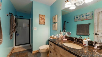 Lodge-style lakefront retreat sitting on over 1 acre with an - photo 50