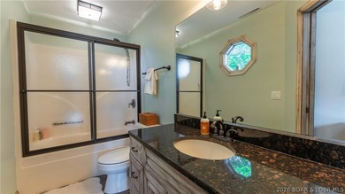 Lodge-style lakefront retreat sitting on over 1 acre with an - photo 53