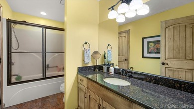 Lodge-style lakefront retreat sitting on over 1 acre with an - photo 57