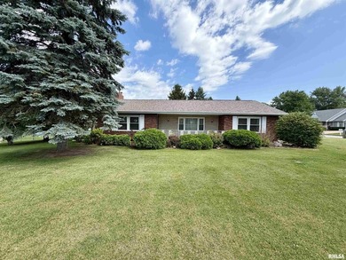 Nestled on a gorgeous corner lot in one of the area's most - photo 1