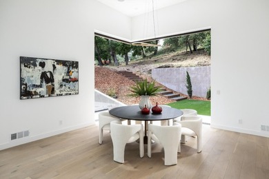 Set on a sprawling 2.02-acre lot with panoramic views of the - photo 16