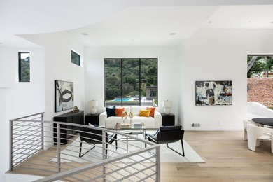 Set on a sprawling 2.02-acre lot with panoramic views of the - photo 17