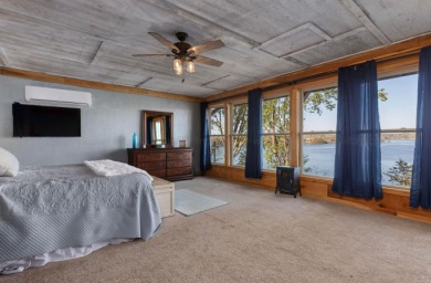This charming two-story lake home offers stunning views and 1 - photo 17