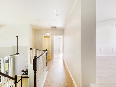 Grand marble tile entry and soaring ceilings set the tone in - photo 20