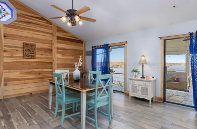 This charming two-story lake home offers stunning views and 1 - photo 20