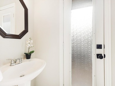 Grand marble tile entry and soaring ceilings set the tone in - photo 21