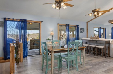 This charming two-story lake home offers stunning views and 1 - photo 21