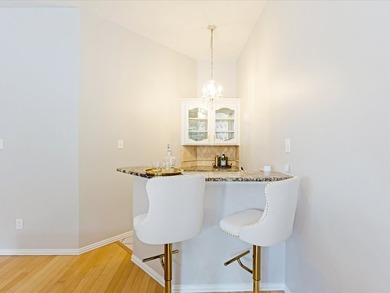 Grand marble tile entry and soaring ceilings set the tone in - photo 23
