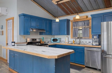 This charming two-story lake home offers stunning views and 1 - photo 23