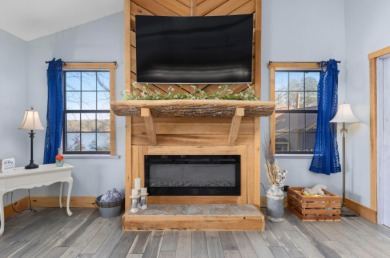 This charming two-story lake home offers stunning views and 1 - photo 25