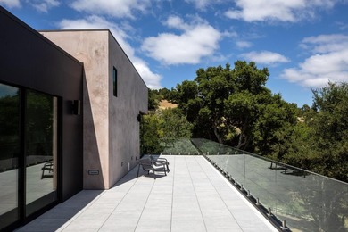 Set on a sprawling 2.02-acre lot with panoramic views of the - photo 26