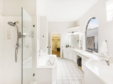 Grand marble tile entry and soaring ceilings set the tone in - photo 26