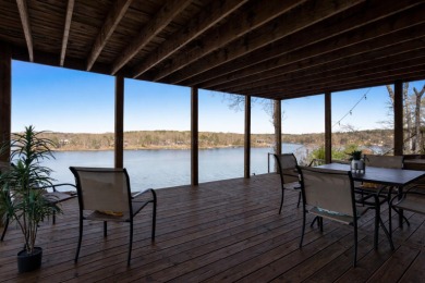 This charming two-story lake home offers stunning views and 1 - photo 28