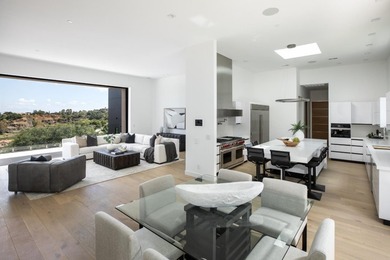 Set on a sprawling 2.02-acre lot with panoramic views of the - photo 30
