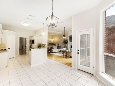 Grand marble tile entry and soaring ceilings set the tone in - photo 32
