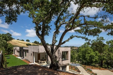 Set on a sprawling 2.02-acre lot with panoramic views of the - photo 36