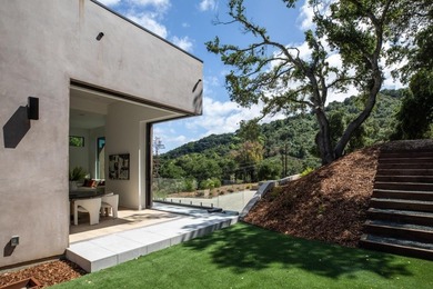 Set on a sprawling 2.02-acre lot with panoramic views of the - photo 39