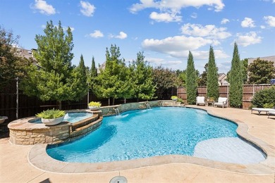 This exquisite home in the highly sought after Twin Creeks