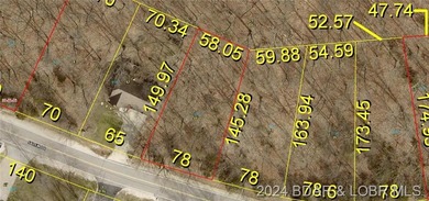 Four Seasons Building Lot that is fairly level and wooded - photo 1
