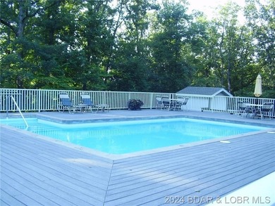 Four Seasons Building Lot that is fairly level and wooded - photo 7