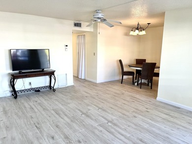 This lovely first floor 2 bedroom, 2 full bath condo is light - photo 3