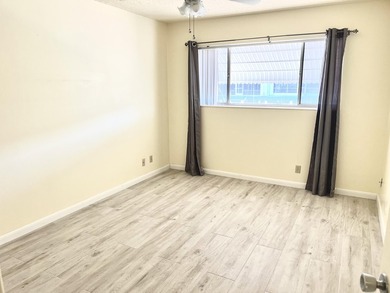 This lovely first floor 2 bedroom, 2 full bath condo is light - photo 6