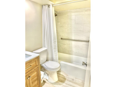 This lovely first floor 2 bedroom, 2 full bath condo is light - photo 9