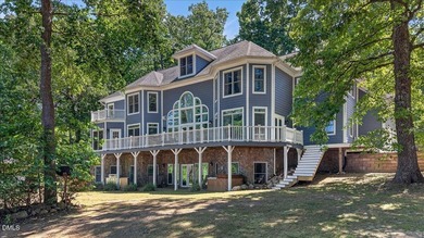 Experience expansive views of Kerr Lake from this impressive - photo 1
