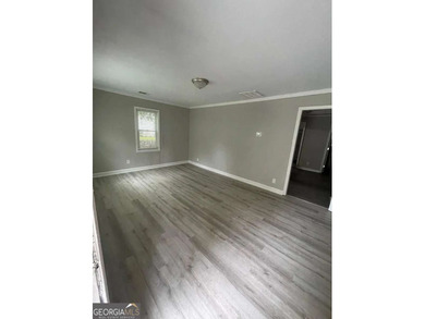 This charming 3- bedroom, 2-bathroom home offers 1,100 sq ft of - photo 4