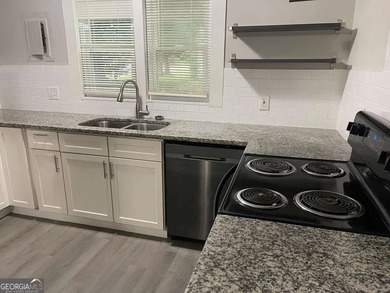 This charming 3- bedroom, 2-bathroom home offers 1,100 sq ft of - photo 6
